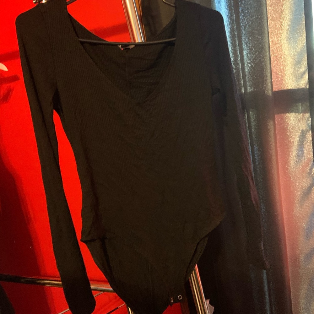 Black scoop neck bodysuit. New with tags